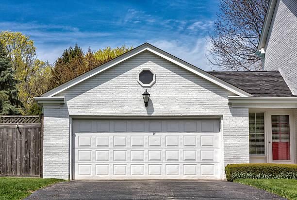 White sectional garage door on a home